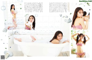 A woman in a pink bikini taking a bath in a bathtub.